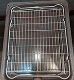 Immaculate oven tray after cleaning